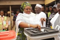 Nigeria's President-elect and his wife pictured casting their votes 