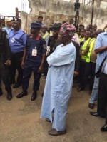 Photos of Jimi Agbaje casting his vote, while Tinubu waits in line to vote