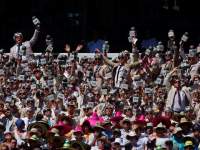 Members of the crowd dressed as former Australian cricketer and commentator Richie Benaud react during the second day's play in the fourth test between Australia and India at the Sydney Cricket Ground (SCG) January 7, 2015.     REUTERS/David Gray      (AUSTRALIA - Tags: SPORT CRICKET TPX IMAGES OF THE DAY) - RTR4KB5Z