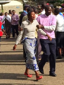 Heart Breaking Pictures Of Family Members Of Kenyan’s Al-Shabaab Militants Massacred Victims, As They Identify The Bodies Of Their Loved Ones