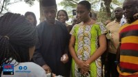 Nigeria Vice President elect, Professor Yemi Osinbajo and his wife getting accredited 