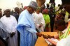 Nigeria President elect General Muhammadu Buhari and his wife Aisha get accredited