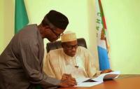 A New Nigeria begins! Picture Of Nigeria President Elect General Buhari With His VP In Office This Morning
