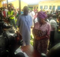 Governor of Lagos State, Raji Babatunde Fashola & his wife, Abimbola pictured getting accredited at his Polling Booth