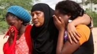 Heart Breaking Pictures Of Family Members Of Kenyan’s Al-Shabaab Militants Massacred Victims, As They Identify The Bodies Of Their Loved Ones