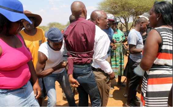 Notorious Pastor Penuel Mnguni Of South Africa, Beaten, Tied Up And His Church Burnt Down